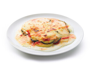 Berenjenas  con bechamel sobre fondo blanco. eggplants with bechamel sauce on white background.