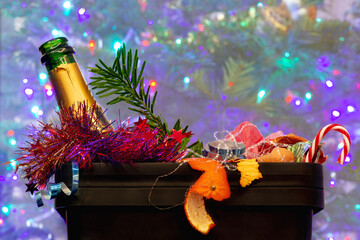 After christmas garbage dump food christmas tree colorful branch empty bottle colorful tincel peel...