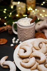 Plate of Traditional German or Austrian Vanillekipferl vanilla kipferl cookies and decorations