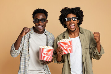 Cinema Fun. Two Cheerful Black Guys In 3d Glasses Holding Popcorn Buckets