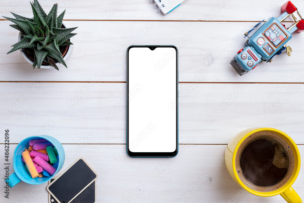 Aufkleber creative work table flat lay composition with smart phone mockup surrounded by robot toy, coffee mug