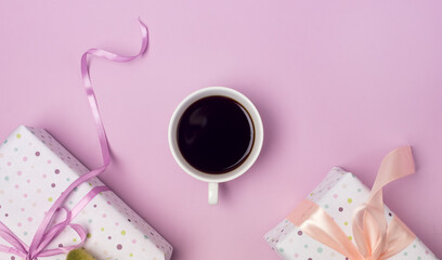 Holiday Breakfast on Holiday with Cup of Coffee and Gift Box on Pink Background Flat lay Long