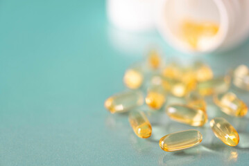 fish oil gelatin capsules in a white bottle