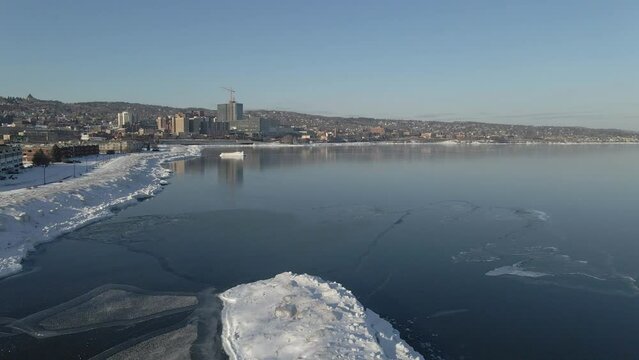 Duluth, port city in Minnesota with the shore of Lake Superior completely frozen