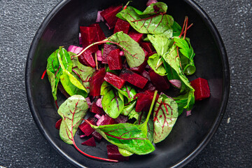 fresh beet salad beetroot, onion, lettuce ready to eat portion dietary healthy meal food diet snack on the table copy space food background 