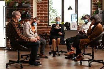 People attending support group therapy with psychiatrist during pandemic. Patients with alcohol...