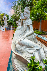 Kuan Yin statues inside Southern Truc Lam Zen Monastery , Vietnam. Famous tourist destination in Can Tho city	
