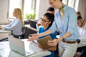 Obraz premium Group of success people working together at corporate workplace. Business teamwork office concept