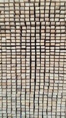 Wooden bars in rows and columns.