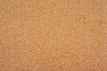 Cork wood texture closeup. Flat sheet of cork.