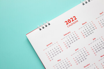 2022 calendar page on blue background business planning appointment meeting concept