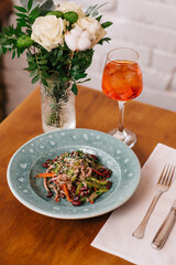 Top view of salad with veal and beans