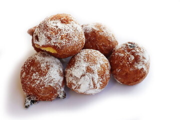 Traditional italian Fritters called Frittelle on white background