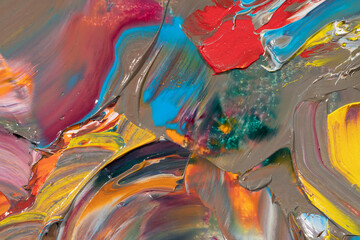 Fototapeta na wymiar Mixed oil paints close-up. Colorful abstract background
