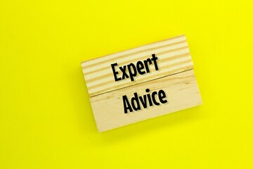 wooden board with the words Expert Advice