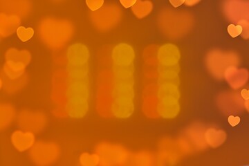 Abstract bokeh blur heart shaped yellow background