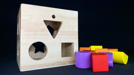 Developing colorful games for intelligence for young children. Shapes, signs, letters for memorization through the game