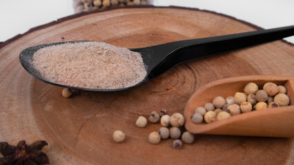 A Spoonful of White Pepper Powder Close Up