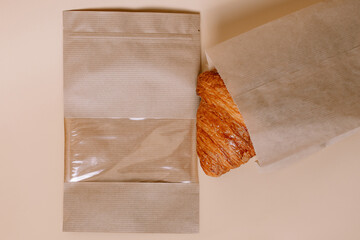 Paper eco bags for buns and products on the background