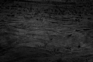 Black wood board texture background. Close-up.