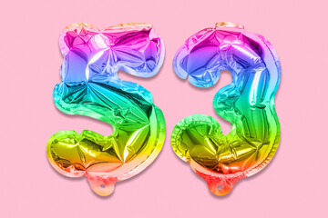 Rainbow foil balloon number, digit fifty three on a pink background. Birthday greeting card with inscription 53. Top view. Numerical digit. Celebration event, template.