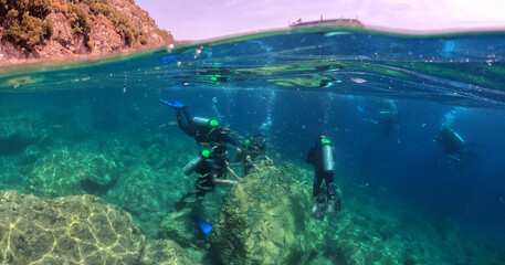 Fototapeta na wymiar Tourists scuba dive Mediterranian Sea. Marmaris,Turkey.