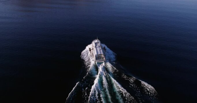 Voloire hydrofoil boat stunning aerial close up navigating on Lake Como.