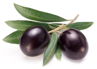Purple olives with leaves on white background. Close-up.
