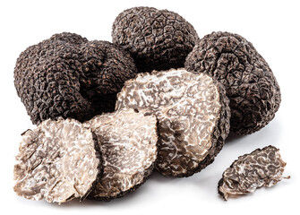Black winter truffles and truffle slices on white background. The most famous of the trufflez.