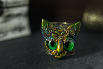 handmade craft green ceramic brooch in the shape of a cat's muzzle with large green glass eyes...