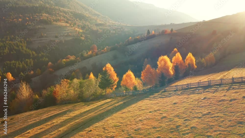 Sticker Gorgeous autumn day in the mountains from a bird's eye view. Filmed in 4k, drone video.