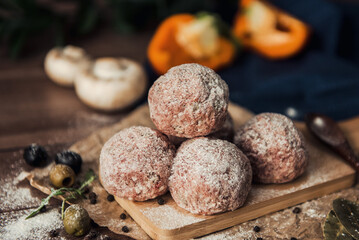 Meatballs on a wooden plate