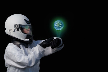 Hologram of earth viewed by a female astronaut