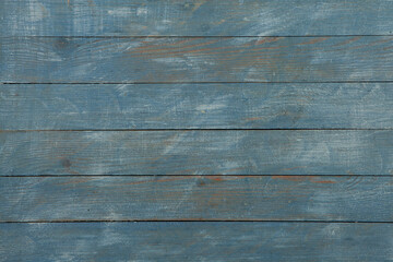 Fototapeta premium Painted wooden board for design or text. Colored wood abstraction.