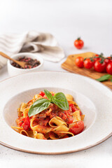 fettuccine with tomato sauce and basil