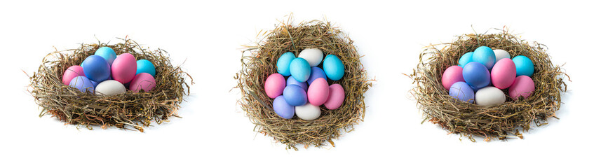 A set of three nests with Easter eggs in different angles isolated on a white background.