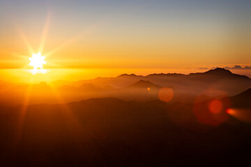 Mountain layers at sunrise on the top of Mousa Mountain in Egypt, South Sinai. Sinai mountains at sunset, Egypt