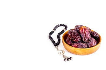 Ramadan Kareem background. Dates fruits and rosary with star and crescent