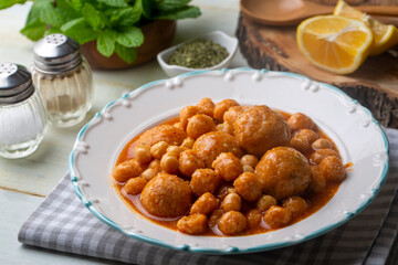 Traditional delicious Turkish foods; Bulgur soup (Turkish name; Anali Kizli, icli kofte)