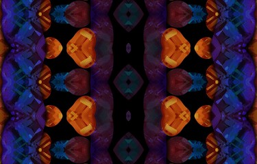 Abstract kaleidoscope background. Beautiful multicolor kaleidoscope texture. Unique kaleidoscope design in red and orange colors on a black background.