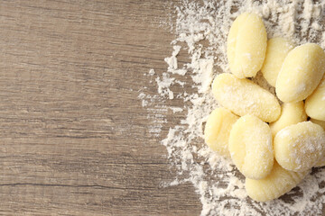 Raw potato gnocchi with flour, space for text