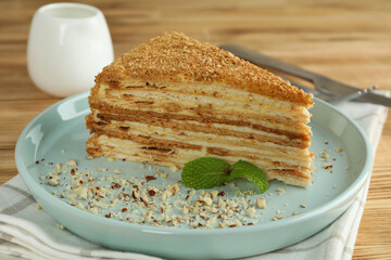 Concept of tasty dessert with honey cake, close up