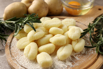 Concept of cooking with raw potato gnocchi, close up