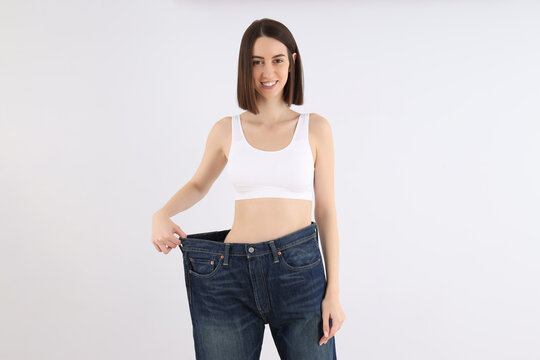 Concept of weight loss with slim girl