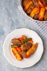 Traditional Homemade Turkish Food Kofte - Kofta with Tomato Sauce and Potatoes. (Turkish name; Izmir kofte)