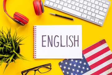 Learning English online lessons concept. Text on student table - obrazy, fototapety, plakaty