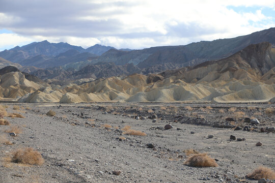 A beautiful shot of a landscape in Death Valey under the cloudy skies