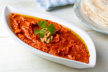 Traditional delicious Turkish appetizer, Muhammara, healthy walnut and roasted red bell pepper dip