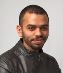 Obraz premium close-up portrait of black male isolated on light gray background