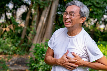 Naklejka na ściany i meble asian older man chest pain.life insurance , retirement.